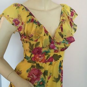 Sleeveless yellow floral v-neck Dress with ruffle trim size small
